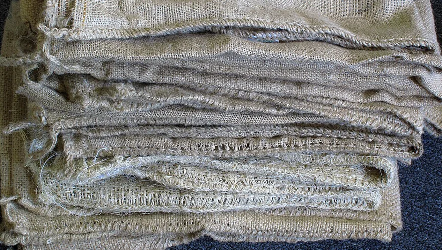 Stacked jute coffee sacks
